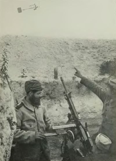 <i>Photo by Western Newspaper Union</i> French Hotchkiss Gun
Firing at Aeroplane