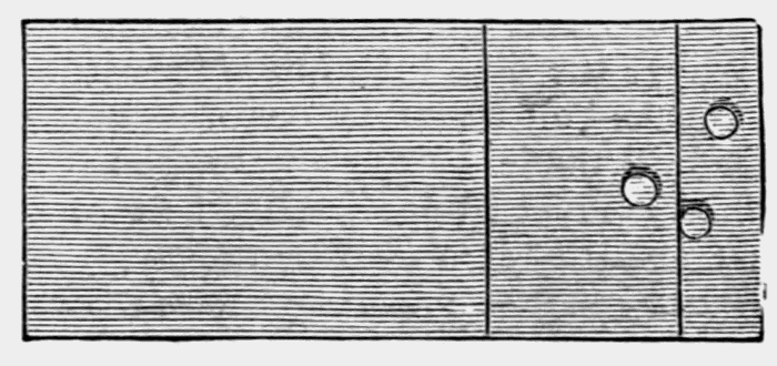 oblong
board with three holes in the right side