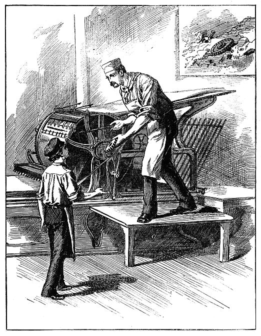 printer handing cog to printer's boy